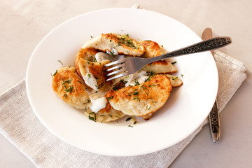 fried dumplings with sour cream