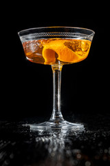 Classic Negroni cocktail isolated on black background.