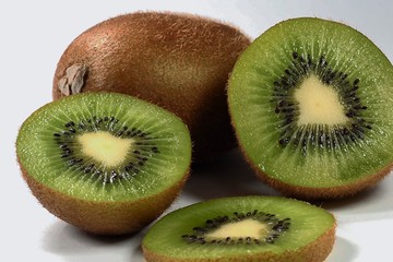 Ripe kiwi on white background