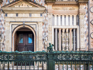 Gates of Basilica of Santa Maria Maggiore in Citta Alta, Bergamo, Italy. Historical architecture and medieval church of Old town or Upper City in Bergamo.