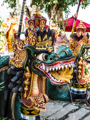Traditional dragon water fountains in Bali