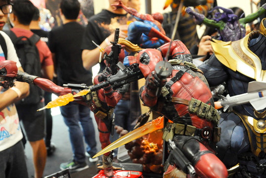 KUALA LUMPUR, MALAYSIA -MARCH 24, 2017: Fiction character of Deadpool from Marvel movies and comic. Deadpool action figure toys displayed by collector for the public.