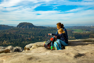 Woman with child while hiking in Saxon Switzerland