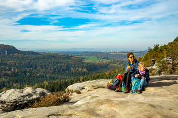 Woman with child while hiking in Saxon Switzerland