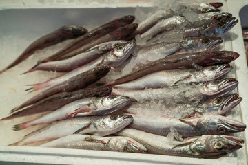 Fresh fish, free of plastic wrappers. In the traditional market, paper is used to wrap food for a long time.