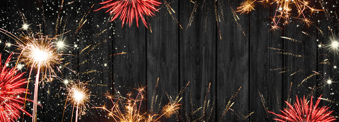 Silvester background banner - Frame made of firework and stars in the night silvester new year...