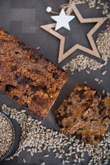 Homemade fruit bread with cosy winter decorations