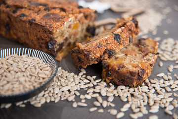 Homemade fruit bread with cosy winter decorations