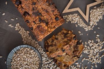 Homemade fruit bread with cosy winter decorations