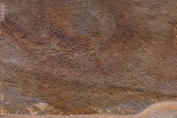 Brown stone wall. Stone texture. Background. Wallpaper. Copy space.