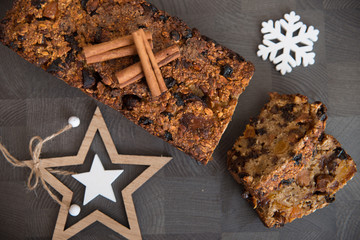 Homemade fruit bread with cosy winter decorations