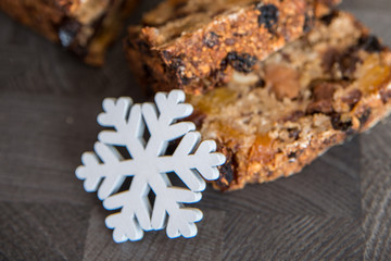 Homemade fruit bread with cosy winter decorations