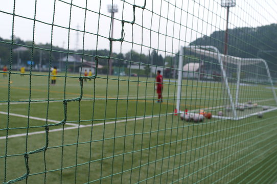 Blurred image, practice scene in a soccer field