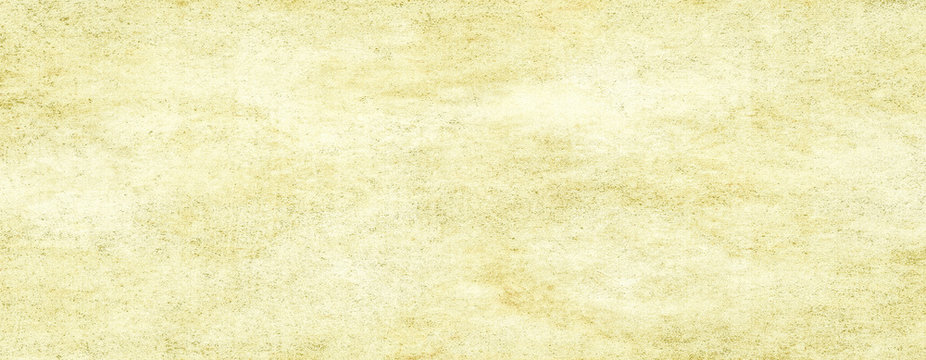 Old yellow light paper background.Light colored vintage paper background for design,web page with copy spice.Long panoramic format.