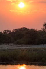 Sunset above Angola, Cubango river, Caprivi Strip, Namibia, Africa