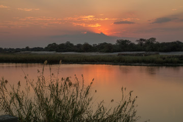 Sunset above Angola, Cubango river, Caprivi Strip, Namibia, Africa