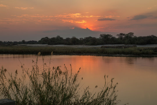 Sunset above Angola, Cubango river, Caprivi Strip, Namibia, Africa