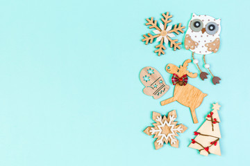 Top view of Christmas decorations on colorful background. New Year composition concept with empty space for your design