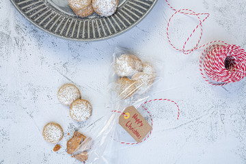 diy christmas  gift idea, cookies wrapped in foil, on a white rustic table