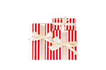 Group of Christmas or other holiday handmade present in red paper with gold ribbon. Isolated on white background, top view. thanksgiving Gift box concept