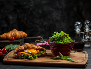 pot with herbs and sandwich