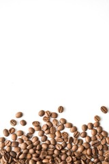 Whole bean coffee. Isolated on a white background. Coffee drink. Top view of coffee. Background with space for text.