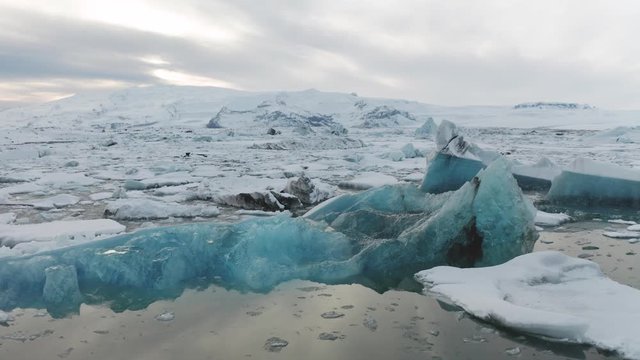 Aerial view of the J kuls rl n glacial lagoon and floating icebergs. The beginning of spring in Iceland
