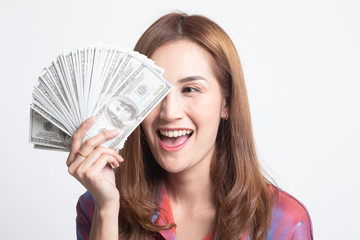 Portrait of  young asian woman  showing bunch of money banknotes.