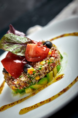 Delicious quinoa salad with avocado and tomatoes. Macro.