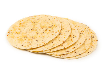 Pitta bread with seeds isolated on white