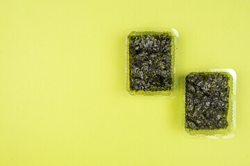 Nori seaweed on a green background.