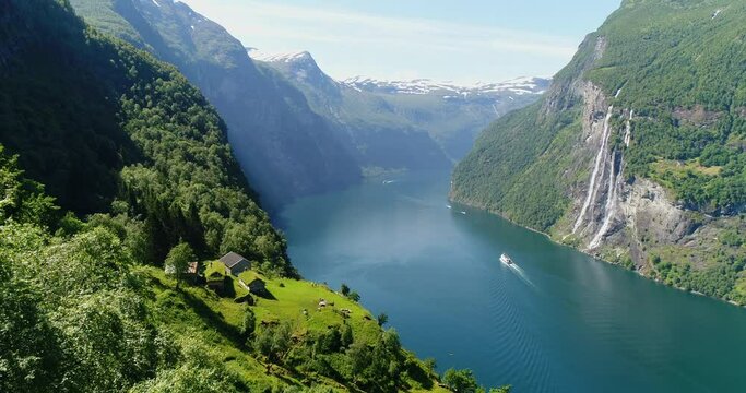 Peaceful Village surrounded by Beautiful Nature and Fjord, Environment and Eco Friendly with Sustainable and Renewable Energy, 4k Aerial Drone Shot