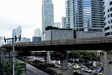 Image of building and condo building at blue sky background.