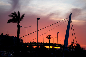 a vibrant blue and golden sunset in the swirling clouds of the izmir-Turkiye