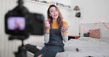 Influencer recording make up tutorial video at home