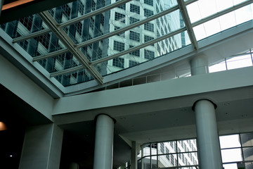 Image of building and condo building at blue sky background.