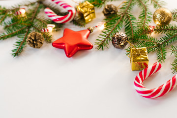 Merry Christmas and happy holidays greeting card, frame. new-year. Christmas decorations and toys, peppermint candy and lights. Winter holiday./ Flat lay. Greeting card