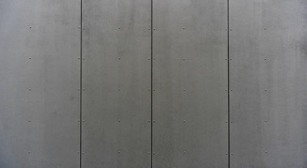 modern materials in the construction industry. Texture of metal cladding of a building facade...