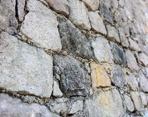 Wall of stone blocks as an abstract background