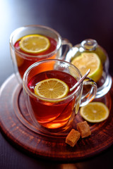 Cup of black tea with lemon