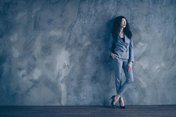 Full length body size view of her she nice attractive lovely pretty classy chic content wavy-haired girl hr partner corporate company leader gray concrete wall background
