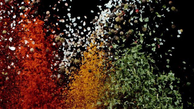 Super slow motion of flying spices mix. Filmed on high speed cinema camera, 1000 fps