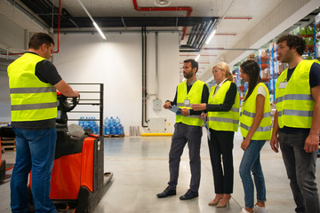 Training on a forklift in warehouse