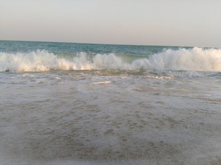 Waves breaking on beach