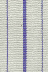 Blue fabric striped texture. Rustic canvas pattern. Colored striped coarse linen fabric closeup as background.
