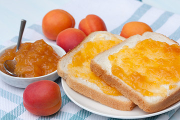 Tasty sandwich with apricot jam.