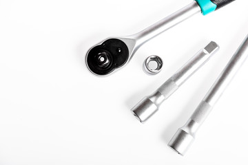 Main advantage of heads used to unwind or tighten nuts and bolts hard to reach places. Home improvement tools concept. Shop for ratchets and sockets in hand tools. Tools for repair and construction