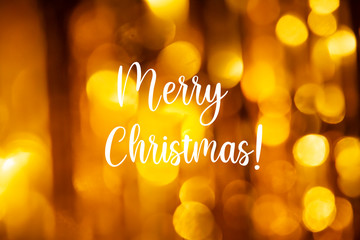 Merry Christmas golden background bokeh wish card