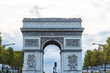 Fototapeta na wymiar Arc de Triomphe at the Champs-Elysees Avenue in Paris, France