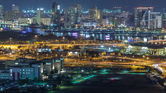 View of new modern buildings at nighttime in luxury Dubai city, United Arab Emirates Timelapse Aerial © neiezhmakov